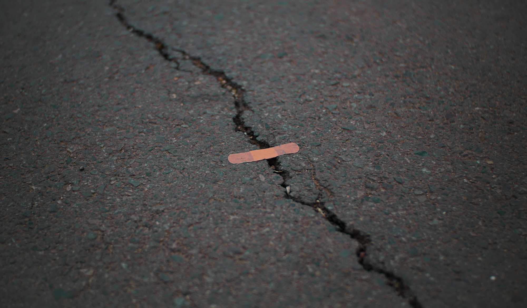 bandaid holdint he pavement together